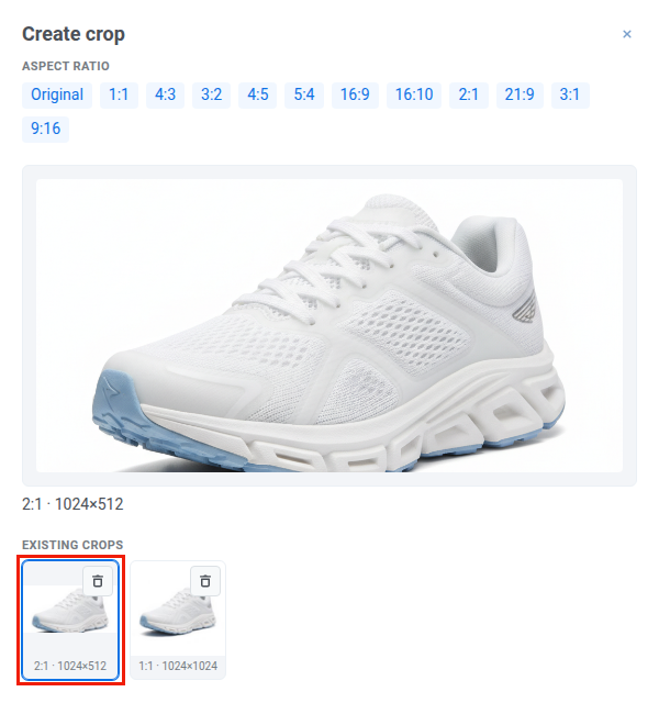Panel 'Zuschnitt erstellen' mit der Vorschau des gespeicherten 2:1-Zuschnitts eines weißen Sneakers, 1024×512, ausgewählt unter 'Vorhandene Zuschnitte' neben einem 1:1-Zuschnitt