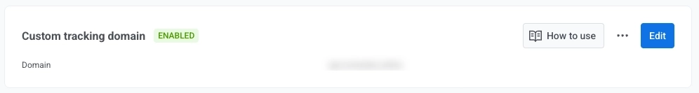 Email channel configuration with the Custom tracking domain section showing the saved click tracking domain in the list.