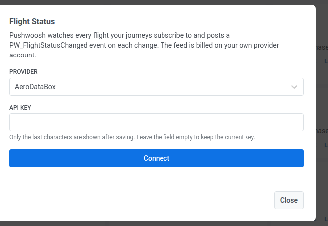 Flight Status Configure dialog with Provider set to AeroDataBox and an empty API key field